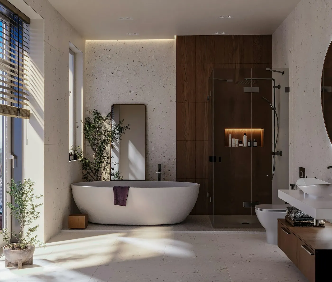 Bagno con vasca freestanding, box doccia in cristallo e mobile sospeso